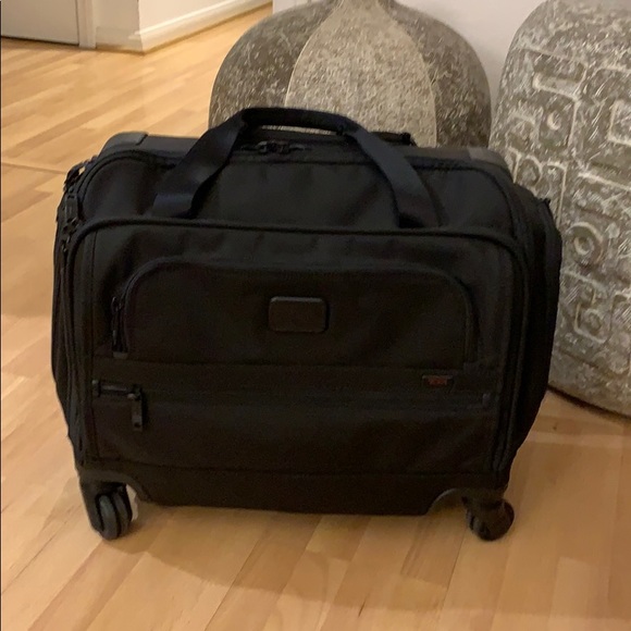 tumi 4 wheeled compact duffel